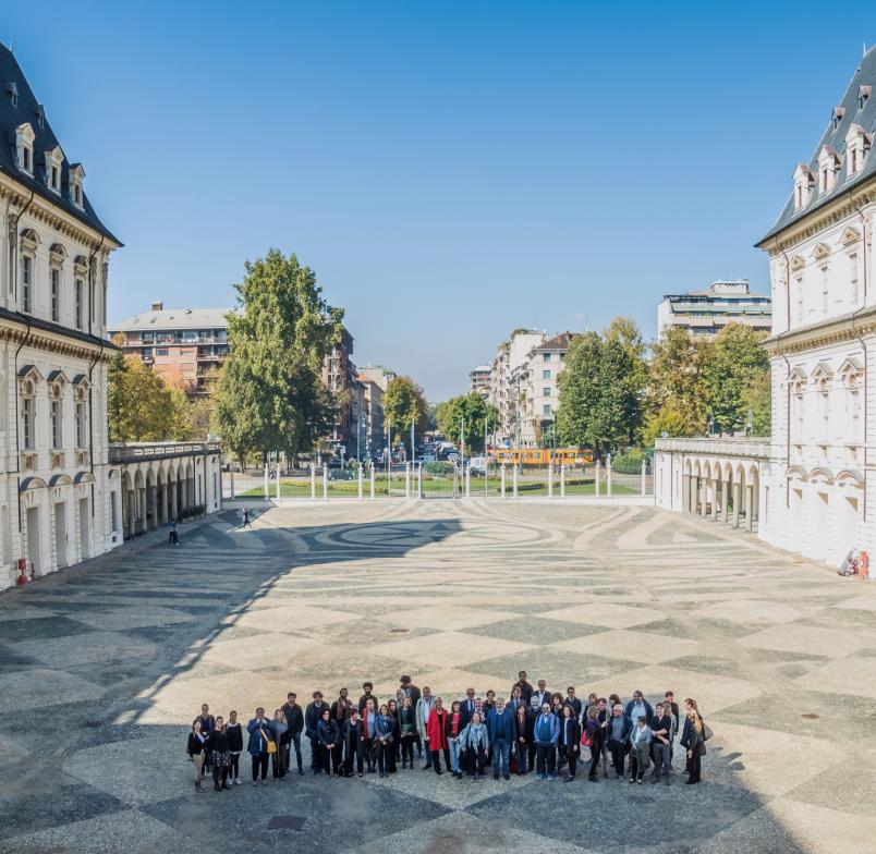 The courtyard of the castle of Valentino with a group of faculties