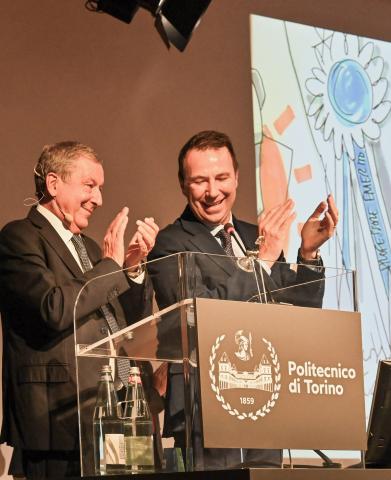 I ringraziamenti di Profumo insieme al Rettore Corgnati
