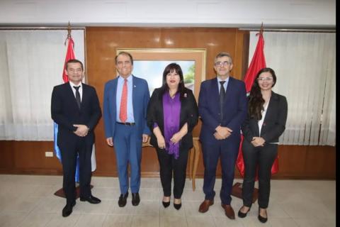 Universidad Nacional de Asuncion Rector, to the right of professor Zanino