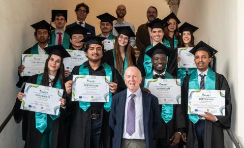 The first graduates with professor Massimo Santarelli