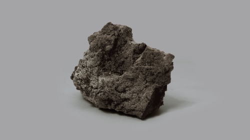 "Cotunnite su lava" minerale di colore grigio scuro