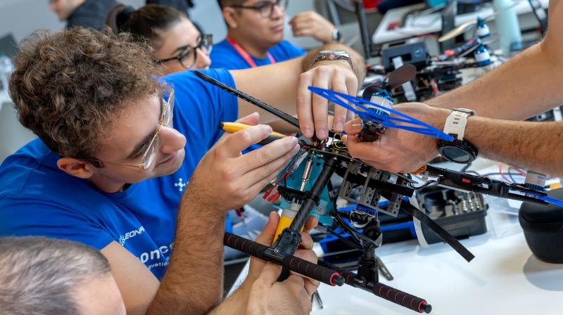The DRAFT team at work on a drone
